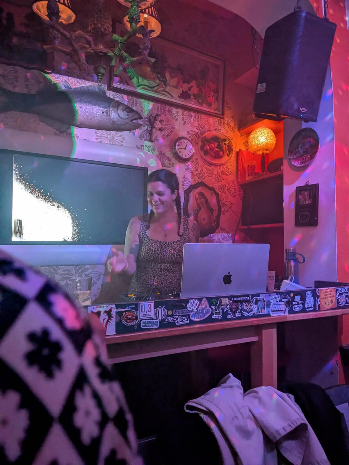 Smiling behind the laptop