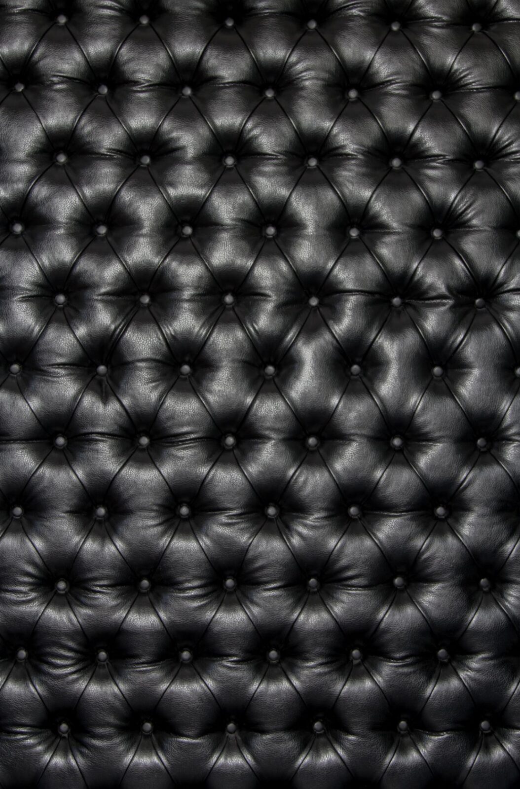 Black tufted leather